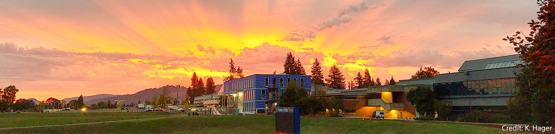 sunrise over Health Professions building construction - credit K. Hager