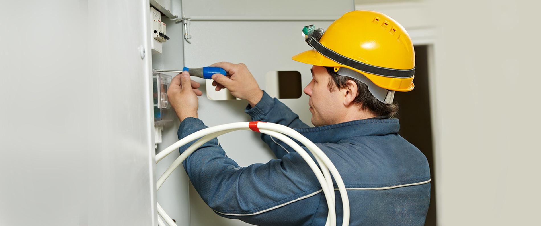 electrician working on an electric box