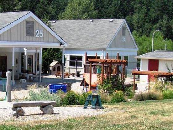 Exterior of LCC Child and Family Center (Building 25) showing the playground