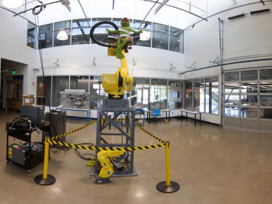 CNC workspace, featuring robotic arm, part of the Advanced Tecnology program